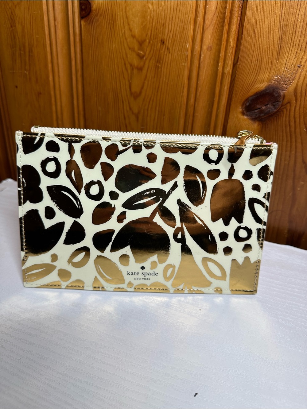 kate spade Gold and White Abstract Patent Zip Pouch